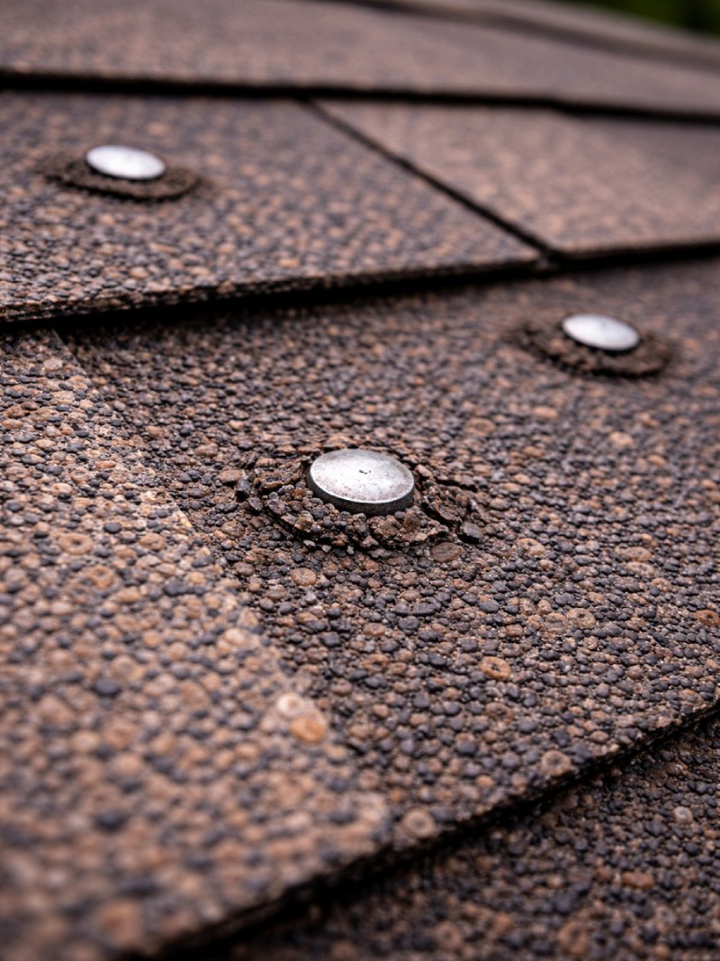 Exposed nail heads / fasteners on shingles