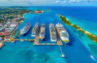 Cruise ship docked at a Mexican Riviera port with sea and coastline