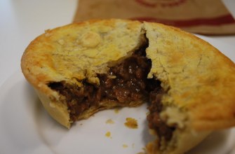 A beef pie with golden pastry
