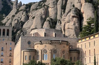The Montserrat monastery set against the serrated rock pinnacles of the mountain in Catalonia