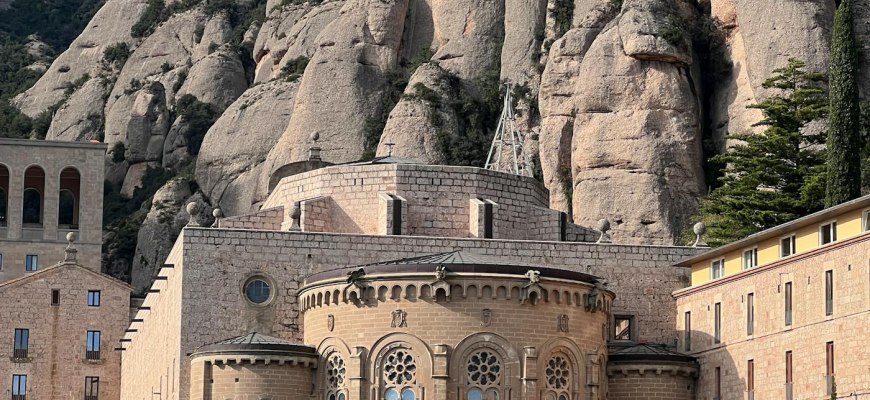 The Montserrat monastery set against the serrated rock pinnacles of the mountain in Catalonia