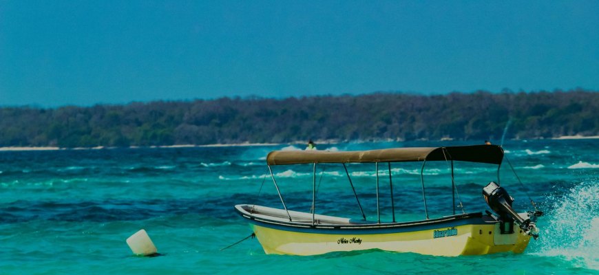 A small rental boat on turquoise water in the Florida Keys