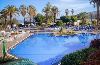 Resort poolside with palms on the Canary Islands