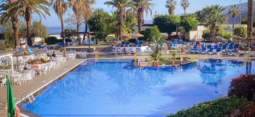 Resort poolside with palms on the Canary Islands