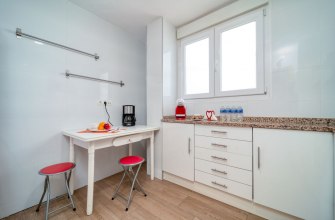 A bright modern kitchen in a self-catering holiday apartment