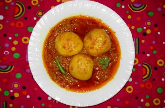 Kashmiri dum aloo, baby potatoes in a red yogurt and chili gravy