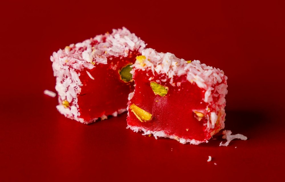 Pistachio Turkish delight cut open to show the green pistachios inside